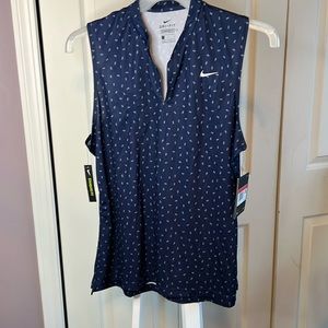 NWT Nike Golf Sleeveless Polo. Navy print. Size L.